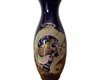 Traditional three toed dragon design. Hand enameled with gilded rim and gilding in the design.