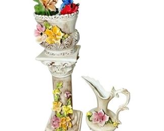 CAPODIMNONTE OF ITALY PORCELAIN COLLECTION 
Made in the 1940s to 1950s.
Appraised at $45 for the ewer (a decorative pitcher), $125 for the jardiniere and pedestal set, and $35 each for the four flowers. Total value $310.