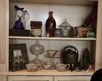 Note the antique jug on bottom shelf