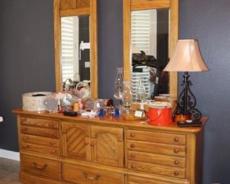 The dresser with attached mirrors with new, oak bedroom suite