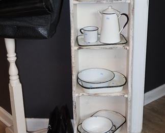 Neat narrow stand; shown with enamel ware that would fit in a toilet enclosure well