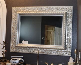 2 large silver mirrors