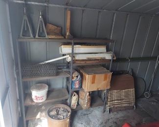 all Along shed wall and fuel cans