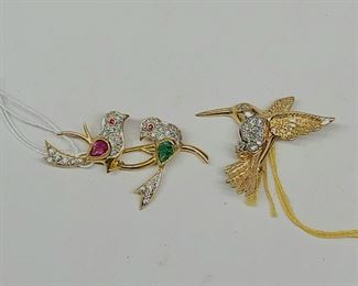 Gold and gemstone brooches