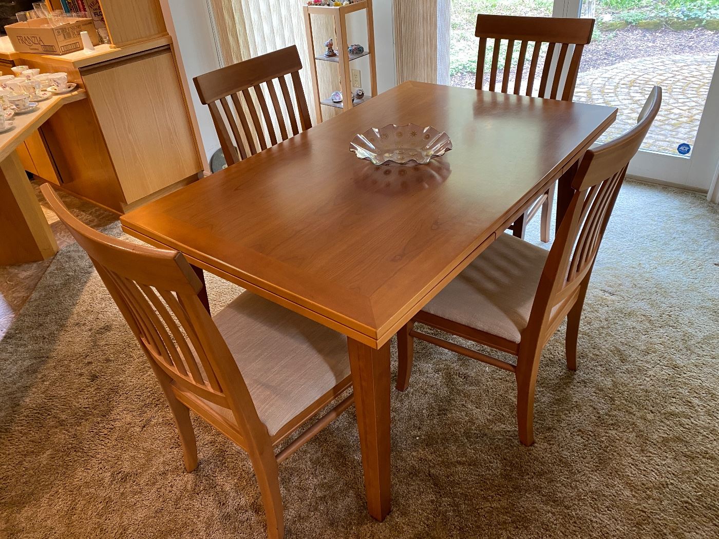 Arhaus Cherry Dining Set w/ 4 Chairs                                         Table dimensions 59” L, 35.5 W, 30.5 tall. 
Two self stored extensions 35.5” each. Can use one at a time or both for a total of 130” long. 
