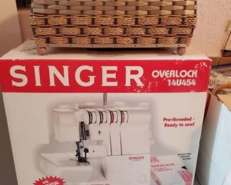 Singer sewing machine
Basket with sewing supplies