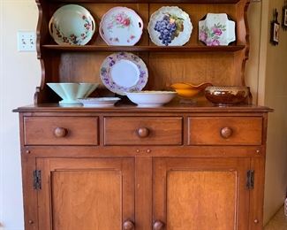 Very cute solid wood china cabinet.