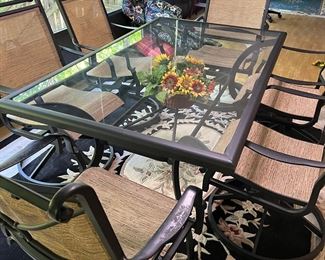 Patio table with 6 swivel chairs