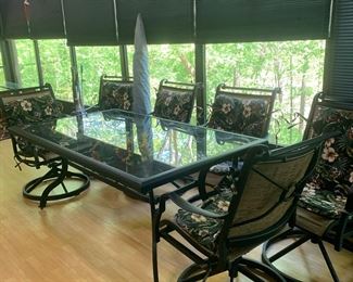 View of patio table with seat cushions