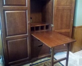 Great fold out desk and storage