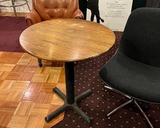 bistro table and leather arm chair