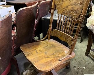 vintage colonial solid oak rolling chair
