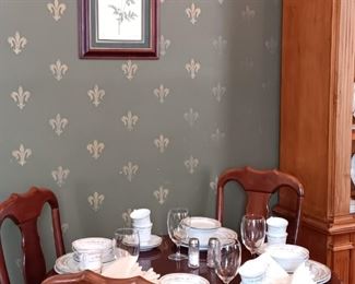 One of several round dining tables and chairs.