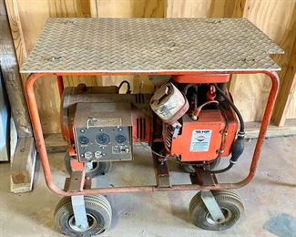 Briggs & Straton 15 HP Motor with Electric Alternator on industrial cart.