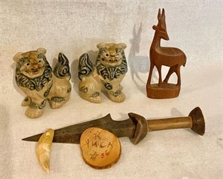 Japanese Ceramic Foo Dogs, Carved Wood Gazelle, African Dagger Knife, Tooth Conch, Wooden YWCA dated 1956.