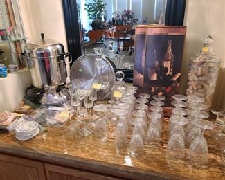 Bar glasses in a variety of sizes; most are $1 each.  Sets with matching decanters are $25-$35/set.  55-cup coffee urn; $49.