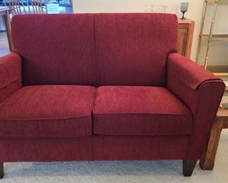 Flexsteel burgundy loveseat; $150. Small table with glass top; $20.  Floor lamp $125.