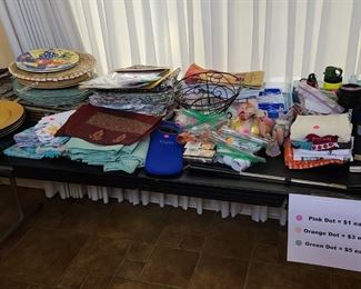 Wide assortment of table linens & kitchen accessories; $1-$5 each.