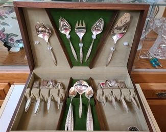 1847 Rogers Bros. silver-plate flatware set with wood storage box; $125/set.