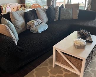 Sofa $450, coffee table $150, carpet $155