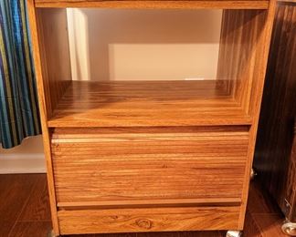 Rolling table with bottom storage