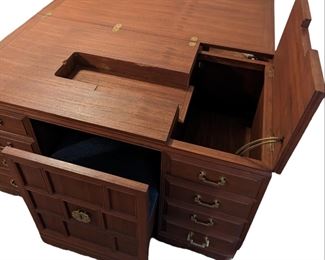 Custom craft and sewing table with built-in chair and storage