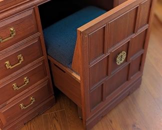 Custom craft and sewing table with built-in chair and storage