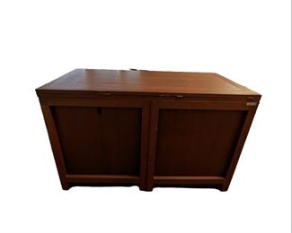 Custom craft and sewing table with built-in chair and storage