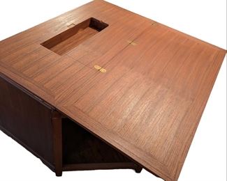 Custom craft and sewing table with built-in chair and storage