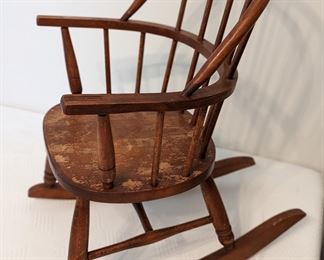Antique colonial wooden rocking chair