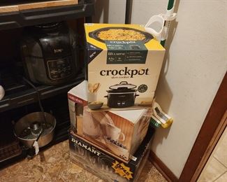lots of cookware, crock pot etc
