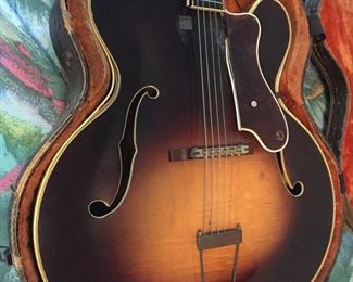 Epiphone Zephyr Emperor guitar with case banding is in need of repair.