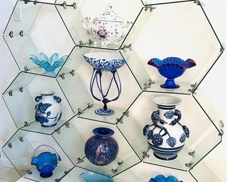 Glass display and lots of pretty vases
