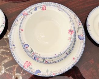 Oneida Blue Lattice porcelain china set. Great everyday set. It is Freezer, Oven, Microwave, and Dishwasher Safe.