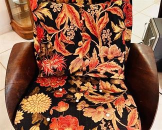 Mid century chair with floral upholstery. 