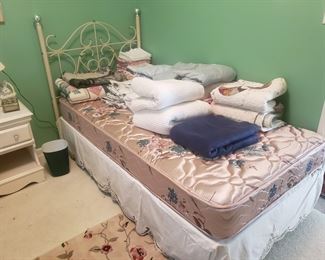 There are a nice pair of twin beds with headframes for sale