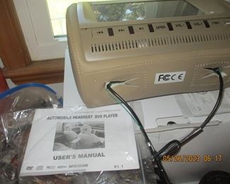 Automobile headrest DVD player