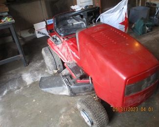 Craftsman lawn mower (needs some work) but did start.  Selling as is
