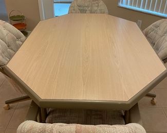 $225 - Kitchen/Dining Room Table (with 4 chairs on casters) Measurements of table (shown with leaf): 59.5" x 41.5" x 29.5"