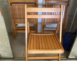 1 of 4 wood folding chairs