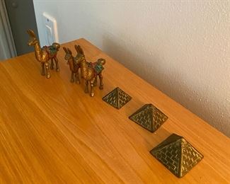 Small Llamas and brass pyramids