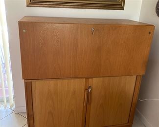 Copenhagen Imports two piece folding desk with lock and four file drawers with locking doors. Top desk 20" X 46 1/2 x 19 1/2", Bottom file drawers 29 x 46" x 19"