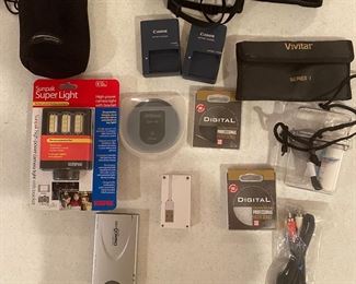 Misc. camera accessories (card readers, filters, lens protector, cleaning supplies)