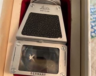 Several vintage cameras and accessories 