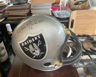 Raiders helmet signed by Jim Plunkett