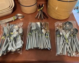 various vintage stainless flatware mixed sets including Leonard Silver Old Rockport, MCM The Cellar Bentley Hexagon, MCM Erik Herlow Obelisk Copenhagen, Royal Doulton Princess teaspoons and MCM Modern Columbia knives