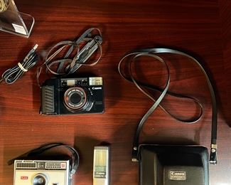 Canon Sure Shot camera, Kodak Instamatic camera, Canon Canonet 28 camera