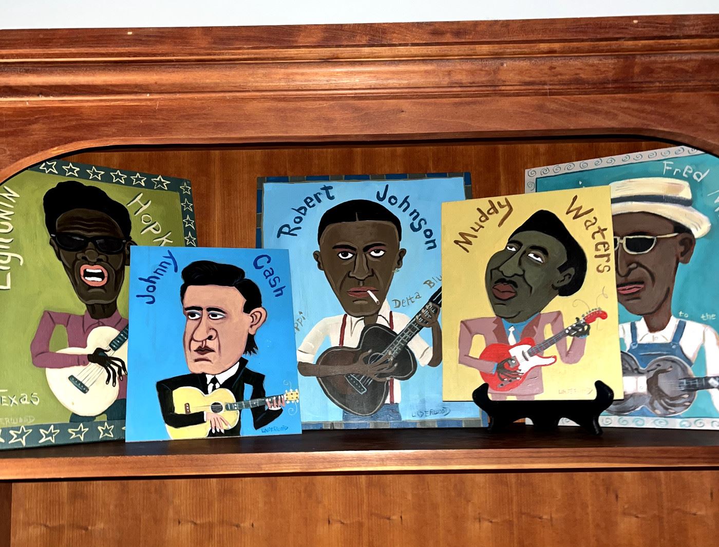 Original signed Jackie Underwood folk art paintings: Muddy Waters, Johnny Cash, Lightnin Hopkins, Robert Johnson and Fred McDowell