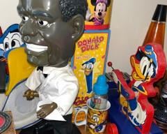 Various collectibles. Singing Louie Armstrong, vintage Donald Duck xylophone pull toy