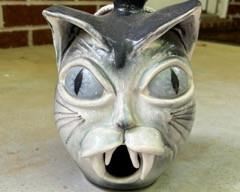 Ceramic cat birdhouse